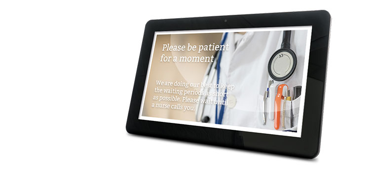 Tablet showing digital signage in healthcare